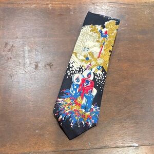 Elegant Black and Gold Tie with Festive Accents